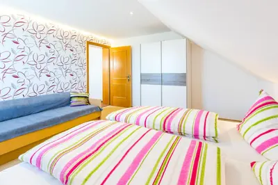 Ein Bett oder Betten in einem Zimmer der Unterkunft Haus Margit