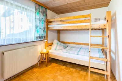Ein Bett oder Betten in einem Zimmer der Unterkunft Haus Margit