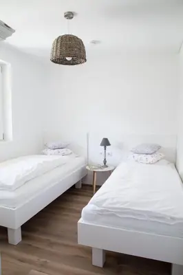 Ein Bett oder Betten in einem Zimmer der Unterkunft ediths Wohnen