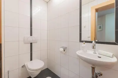 Ein Badezimmer in der Unterkunft Haus Helena