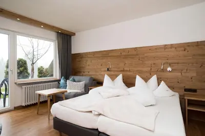 Ein Bett oder Betten in einem Zimmer der Unterkunft Gästehaus Wildbach