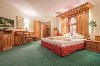 Ein Bett oder Betten in einem Zimmer der Unterkunft Hotel Vitalquelle Montafon