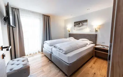 Ein Bett oder Betten in einem Zimmer der Unterkunft Appartements Eldorado