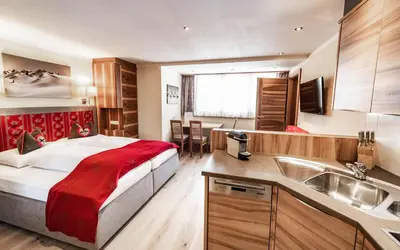 Ein Bett oder Betten in einem Zimmer der Unterkunft Appartements Eldorado