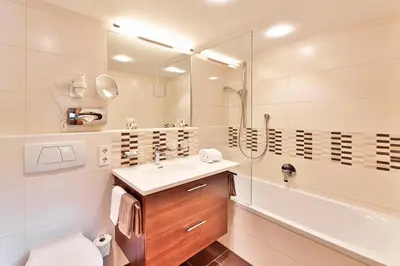 Ein Badezimmer in der Unterkunft Pension Regina