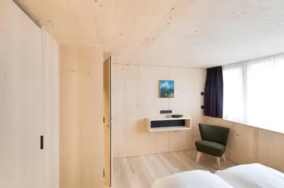 Ein Bett oder Betten in einem Zimmer der Unterkunft Försterhaus Mellau