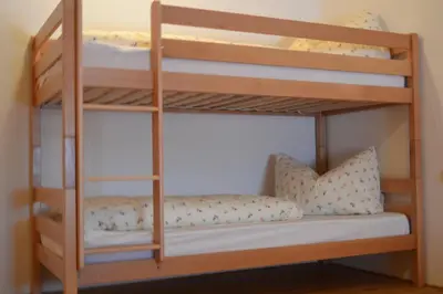 Ein Bett oder Betten in einem Zimmer der Unterkunft Bauernhof Feurstein