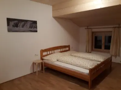 Ein Bett oder Betten in einem Zimmer der Unterkunft Bauernhof Feurstein