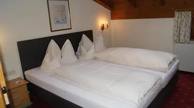 Ein Bett oder Betten in einem Zimmer der Unterkunft Hotel Hartenfels