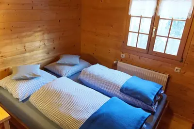 Ein Bett oder Betten in einem Zimmer der Unterkunft Landhaus Tenne