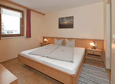 Ein Bett oder Betten in einem Zimmer der Unterkunft Tre Soli Appartements Restaurant