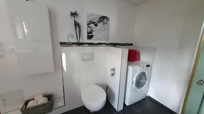 Ein Badezimmer in der Unterkunft F E R I E N W O H N U N G 