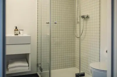 Ein Badezimmer in der Unterkunft Krone Hard - self check-in
