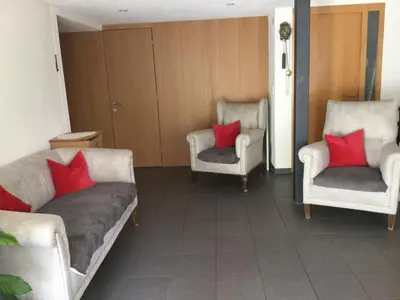 Ein Sitzbereich in der Unterkunft Gästehaus Pfandl