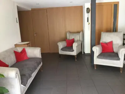 Ein Sitzbereich in der Unterkunft Gästehaus Pfandl
