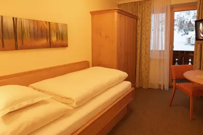 Ein Bett oder Betten in einem Zimmer der Unterkunft Pension Gallus