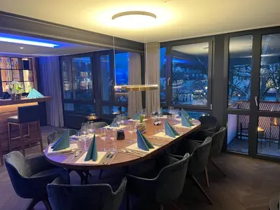 Ein Restaurant oder anderes Speiselokal in der Unterkunft Zimmer & Appartements am Schloßplatz