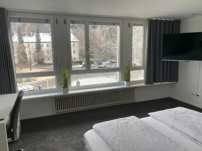 Ein Bett oder Betten in einem Zimmer der Unterkunft Zimmer & Appartements am Schloßplatz
