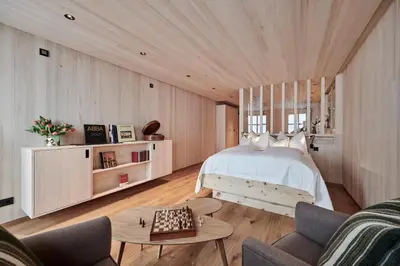 Ein Bett oder Betten in einem Zimmer der Unterkunft Hotel Mohnenfluh