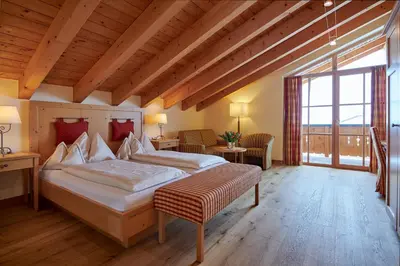 Ein Bett oder Betten in einem Zimmer der Unterkunft Hotel Mohnenfluh