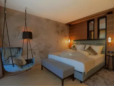 Ein Bett oder Betten in einem Zimmer der Unterkunft Boutique Hotel die Mittagspitze Superior