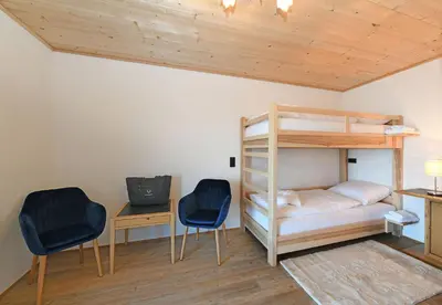 Ein Bett oder Betten in einem Zimmer der Unterkunft Hotel St Hubertus