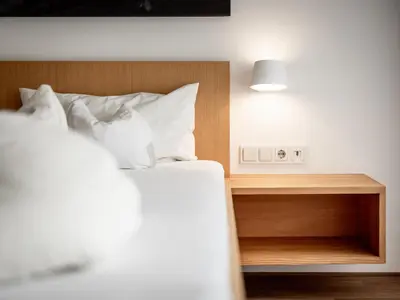 Ein Bett oder Betten in einem Zimmer der Unterkunft Hotel Engel