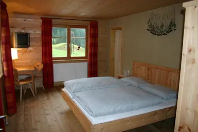 Ein Bett oder Betten in einem Zimmer der Unterkunft Villa Natur