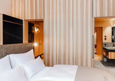 Ein Bett oder Betten in einem Zimmer der Unterkunft Hotel Alpenstern