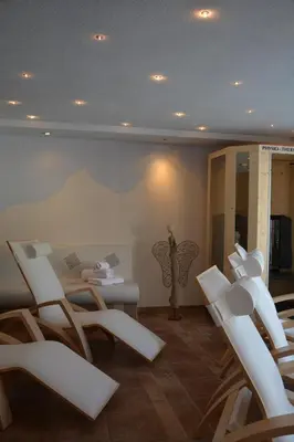 Ein Sitzbereich in der Unterkunft Hotel Garni Alpina