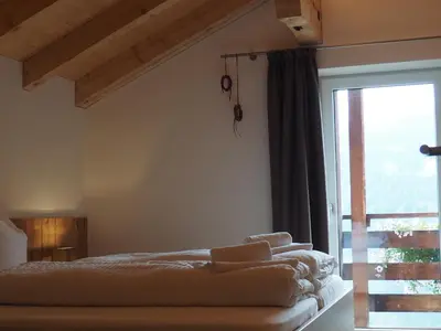Ein Bett oder Betten in einem Zimmer der Unterkunft Bergerhof Fontanella