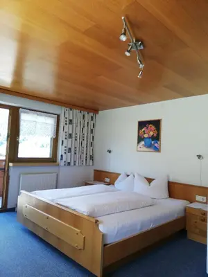 Ein Bett oder Betten in einem Zimmer der Unterkunft Haus Ritter 286