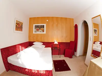 Ein Bett oder Betten in einem Zimmer der Unterkunft Pension Grissemann
