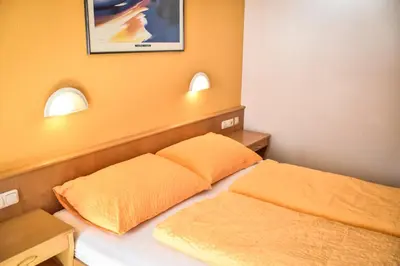 Ein Bett oder Betten in einem Zimmer der Unterkunft Haus Alpenblick