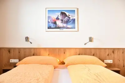 Ein Bett oder Betten in einem Zimmer der Unterkunft Haus Alpenblick