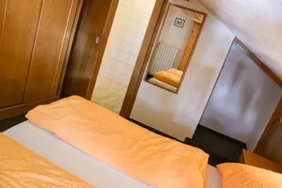 Ein Bett oder Betten in einem Zimmer der Unterkunft Haus Alpenblick