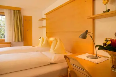Ein Bett oder Betten in einem Zimmer der Unterkunft Appart Andrea
