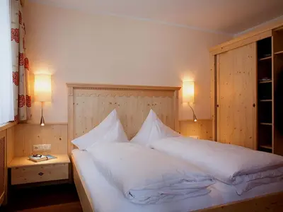 Ein Bett oder Betten in einem Zimmer der Unterkunft Pension Waldhof