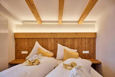 Ein Bett oder Betten in einem Zimmer der Unterkunft Pension Widderstein