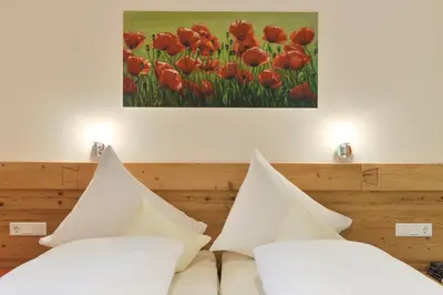 Ein Bett oder Betten in einem Zimmer der Unterkunft Pension Widderstein