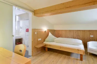 Ein Bett oder Betten in einem Zimmer der Unterkunft Pension Widderstein