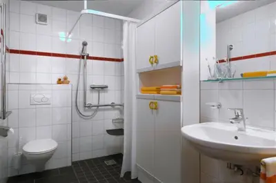 Ein Badezimmer in der Unterkunft Schweizer Hof