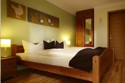 Ein Bett oder Betten in einem Zimmer der Unterkunft Schweizer Hof