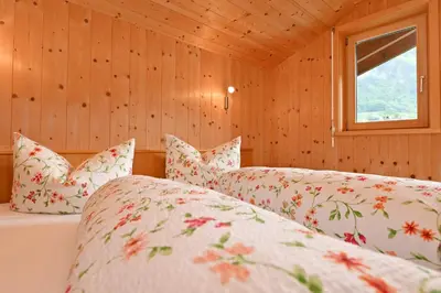 Ein Bett oder Betten in einem Zimmer der Unterkunft Appartements Willi