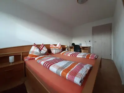 Ein Bett oder Betten in einem Zimmer der Unterkunft Familie Ohneberg