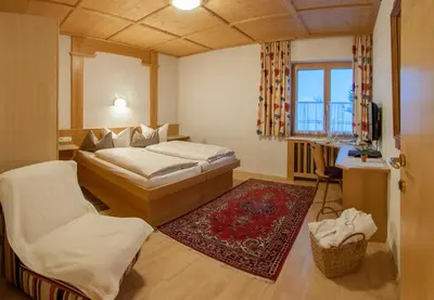 Ein Bett oder Betten in einem Zimmer der Unterkunft Pension Alwin