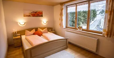 Ein Bett oder Betten in einem Zimmer der Unterkunft Haus Annette