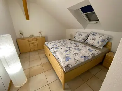 Ein Bett oder Betten in einem Zimmer der Unterkunft Haus Stegmeir