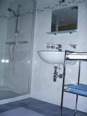 Ein Badezimmer in der Unterkunft Haus Dreiländerblick