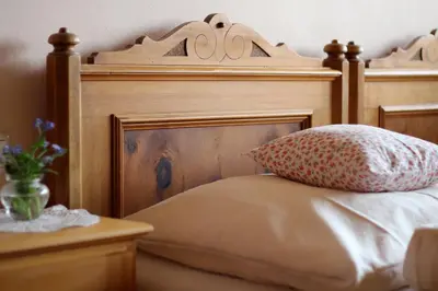 Ein Bett oder Betten in einem Zimmer der Unterkunft Bio Ferienbauernhof Greber - Natururlaub mit Ponys & Kaninchen